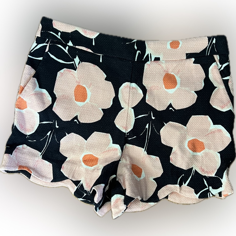 Anthropologie Navy, Pink and Coral Floral Scallop-Hem Shorts with side zipper.